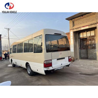 Vente en gros : Minibus Coaster d'occasion fiable avec moteur diesel 6 cylindres et configuration personnalisée pour Toyota