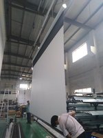 Écran motorisé encastré au plafond de haute qualité, ALR 4K 16:9, transparent acoustiquement, en PVC souple, à tension par languettes, rétractable