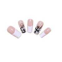 Bestseller transfrontalier : Autocollants pour ongles personnalisables, style français minimaliste blanc, motifs tête de mort et visage de fantôme d'Halloween, faux ongles.