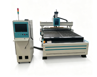 Routeur CNC à changement d'outils automatique avec magasin de 12 outils pour la production d'armoires de cuisine