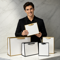 Sacs en papier de haute qualité en gros, sacs cadeaux avec poignée en ruban, sacs fourre-tout personnalisés avec logo, sacs fourre-tout en coton écologique