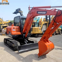 Chargeuse-pelleteuse sur chenilles DOOSAN DX60-9C d'occasion, mini-chargeuse DX60 avec pelle rétrocaveuse, mini-excavatrice hydraulique à vendre