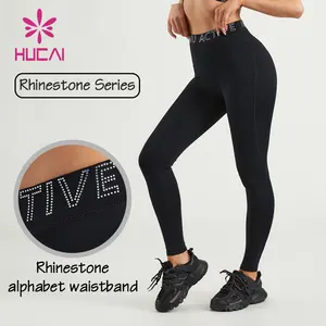 HUCAI OEM logotipo personalizado cintura alta Control de barriga deportes Rhinestone alfabeto pretina gimnasio leggings yoga pantalones para mujeres