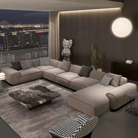 Ensemble de canapés modulaires en forme de L de style italien minimaliste avec cadre en bois, rembourrage en éponge et revêtement en tissu givré pour grand appartement