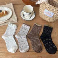 Chaussettes mi-mollet pour femme en jacquard épais Fair Isle, en coton, style Instagram, tendance printemps-automne, blanches, à motifs floraux délicats