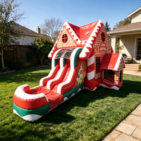 Château gonflable de qualité supérieure avec toboggan et décorations de pain d'épices pour la location d'événements sur le thème du pays des merveilles d'hiver