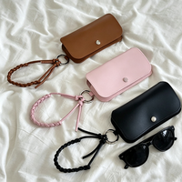 Étui à lunettes fin en cuir PU avec dragonne tressée, pochette portable pour lunettes de soleil
