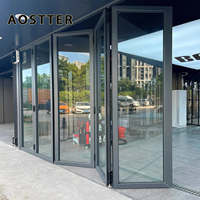 Porte patio extérieure pliante, double vitrage en aluminium, résistante aux chocs et à l'humidité pour villa résidentielle