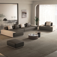Canapé d'angle en cuir véritable minimaliste italien moderne avec coussins rembourrés en éponge et pieds en bois pour salon
