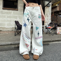 Jean en denim blanc déchiré pour homme, style américain, avec graffiti peint à la main et imprimé dessin animé, coupe ample et jambe large