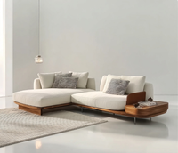 Canapé d'angle modulable de luxe moderne en tissu écologique capitonné pour salon de villa