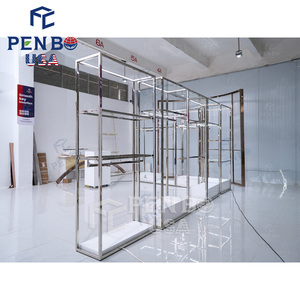 Estante de ropa plateado de acero inoxidable personalizado, estante de ropa de boutique, tienda al por mayor, estantes de exhibición de ropa de boutique - Product Image 1