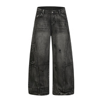 Jeans déchirés et délavés style streetwear hip-hop américain, coupe large, effet couteau, amples et patchés, résistants et durables