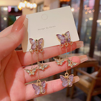 Boucles d'oreilles longues papillon en cristal violet esthétique pour femmes