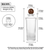 Flacon de parfum cylindrique en verre de luxe de 180 ml avec vaporisateur à pompe, design rayé sérigraphié, finition dorée, boîte