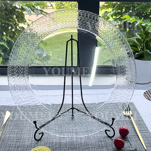 Table ronde Bangui 120cm Céramique effet marbre Blanc et pieds croisés Métal Noir