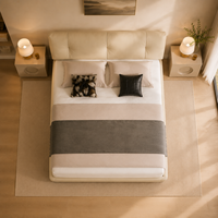 Lit moderne beige écologique en cuir véritable rembourré avec des tables de chevet circulaires et une tête de lit rembourrée