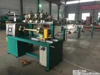 Machine d'enroulement automatique de bobines de réacteurs haute tension pour transformateurs de distribution de petite et moyenne taille