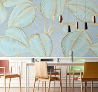Papier peint mural en art linéaire doré avec des feuilles tropicales bleues pour salon de beauté, salon et boutique