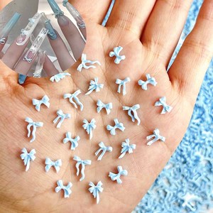 100 pièces <span class=keywords><strong>Macaron</strong></span> bleu ciel nœuds papillon cravates Nail Art décorations 3D nouveau ruban vague arcs résine ongles breloques pour bricolage ongles décorations - Product Image 3