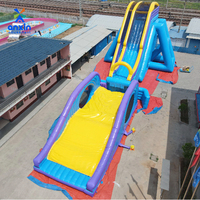 Toboggans aquatiques gonflables géants bleus pour enfants et adultes, prix d'usine