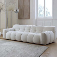 Canapé d'angle moderne en tissu crème, style décontracté et simple INS, idéal pour petit appartement, deux places tendance pour salon.