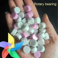 Mini moulin à vent en plastique fait à la main boucle inférieure roulement rotatif chaussures fleur Base petit arbre rotatif résultats de bijoux composants
