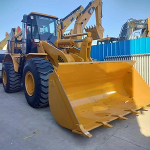 รถตักล้อยาง Caterpillar 966H ขนาด 7 ตัน สีเหลือง บุ้งกี๋มาตรฐาน กำลัง 92 กิโลวัตต์ ปั๊มไฮดรอลิก สำหรับใช้งานในสถานที่ก่อสร้าง - Product Image 1