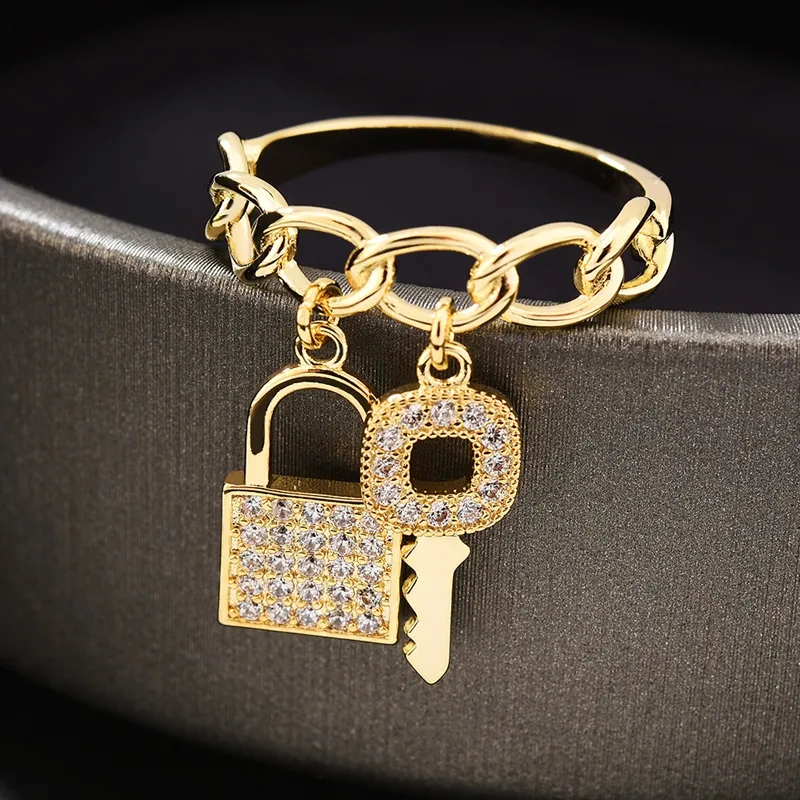 Kuvi — bague en cuivre plaqué or 18K, anneau de verrouillage à clés en zircon cubique, Micro incrusté pour femmes