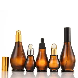 Flacon de sérum <span class=keywords><strong>en</strong></span> verre ambré de luxe avec compte-gouttes Elegant Gold Accents Single Double Gourd Design - Product Image 5