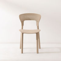 Nouvelle Arrivée En Gros Usine Prix Trou Siège Moderne Noir Polypropylène PP Résine Patio Salle À Manger En Plein Air En Plastique Restaurant Chaise