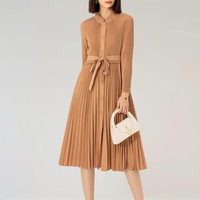 Nouvelle robe mi-longue plissée Miyake à col montant pour femme, manches longues, taille nouée, coupe trapèze, décontractée, pour le bureau, avec boutons décoratifs