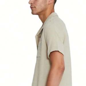 เสื้อยืดผ้าฝ้าย100สำหรับผู้ชายเสื้อทรงสลิมฟิตติดกระดุมแบบลำลองติดโลโก้ - Product Image 5