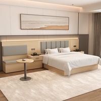 Maßgefertigtes Modernes Hotel-Möbelset für Standard-/Gästezimmer Weiches Polsterbett mit TV-Tisch & Rückenlehne für Apartments