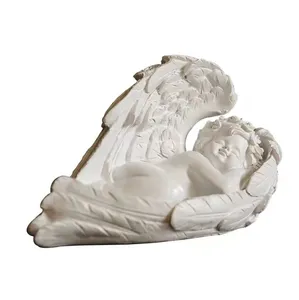 Resina Ángel niño acostado en ALA cuna hogar artesanía estatua