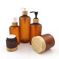 Botol Gel Mandi Bulat Amber Matte Plastik PET Kosong dengan Pompa Lotion untuk Serum Perawatan Kulit & Sampo