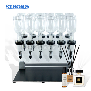 เครื่องบรรจุน้ำหอมแบบแมนนวล เครื่องจำหน่ายน้ำหอมสำหรับร้านน้ำหอม เติมและจ่ายน้ำหอมได้ง่าย - Product Image 1