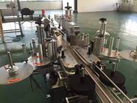 Machine d'étiquetage automatique double face pour bouteilles |   Applicateur d'autocollants de haute précision pour bouteilles rectangulaires