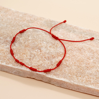 Bracelet bohème ajustable en corde cirée tressée avec breloque porte-bonheur d'amitié – Cadeau artisanal pour femme pour les fêtes