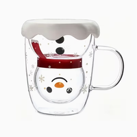 Tasse en verre à double paroi Père Noël avec poignée transparente, couvercle en forme de boule de neige et motif flocon de neige