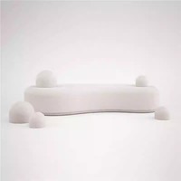 Un canapé en bois moderne et minimaliste de forme unique, recommandé par le designer, adapté aux villas et aux salons.