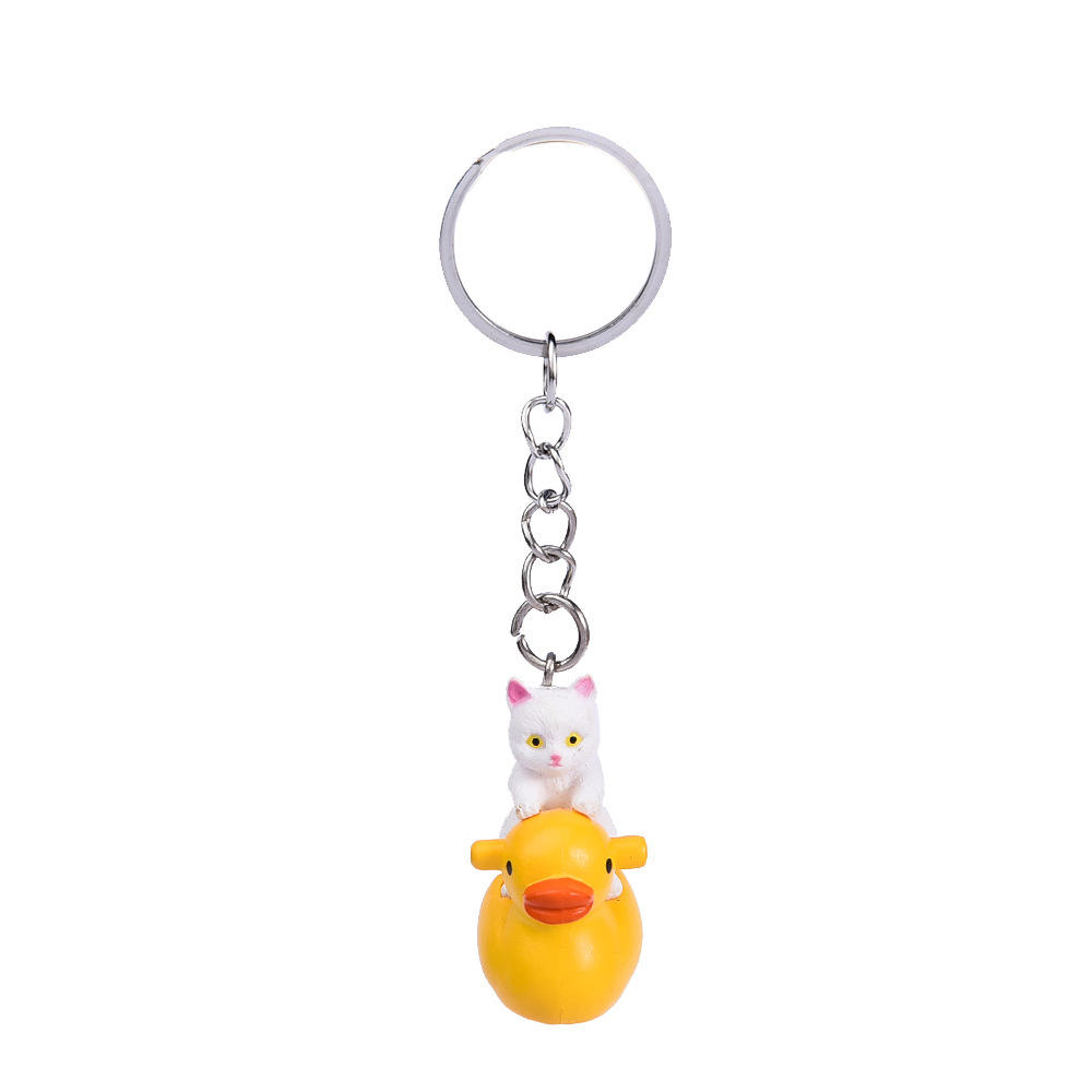 Yellow duck + white cat keychain