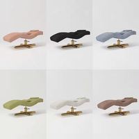 Nouveau lit de beauté incurvé de lit facial de cils verts populaires avec base en acier inoxydable pour l'application de gymnase de chambre d'hôtel de salon