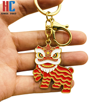 Porte-clés artisanal commémoratif du Festival du Printemps, motif Danse du Lion chinois, en métal émaillé plaqué or moderne, personnalisé, de fabrication usine avec 23 ans d'expérience