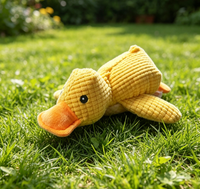 Nouvelle petite peluche pour chiens de compagnie, en forme de canard en coton et caoutchouc, qui émet des sons, offrant des avantages éducatifs et anti-stress