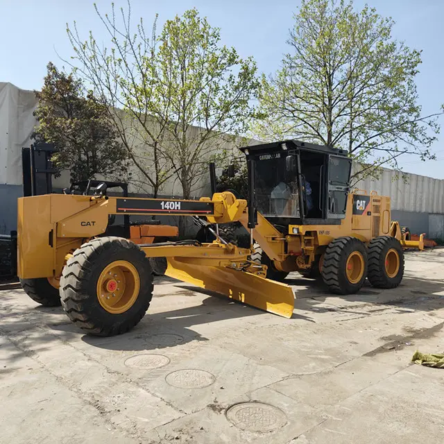 Caterpillar CAT 140H bekas tangan halus dan kuat Caterpillar 140H Motor grader kondisi baik roda