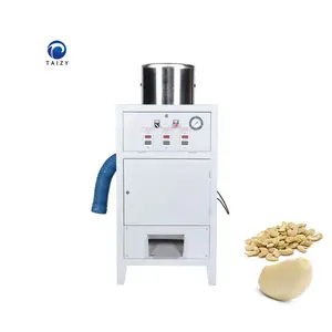 Mesin pengupas biji kacang mete otomatis dengan kompresor udara