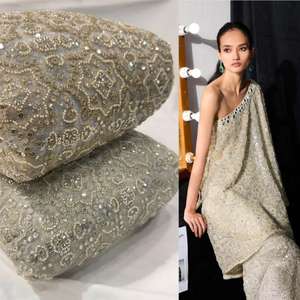 Perles faites à la main sur tissu en filet importé, matériau de designer haut de gamme, parfait pour les robes de mariée, les saris, les lehengas et les vêtements de haute couture - Product Image 4