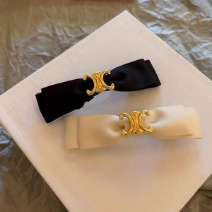 French Hepburn style, versatile for commuting, textured black satin <b>bow</b> hair <b>clip</b>, high-end spring <b>clip</b> hair accessory. - Product Image 1