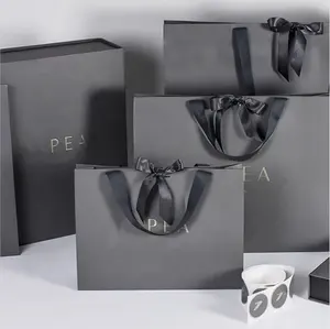 Paper Bag With Ribbon Custom Printed Logo Luxury Sac En Papier Matt Black Shopping Paper Gift Bags Packaging With Ribbon Handle